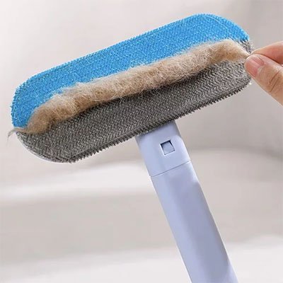 Brosse anti poil ergonomique double face