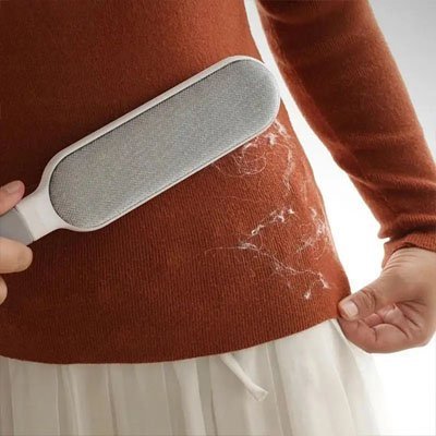 Brosse anti poil nettoie les vêtements 